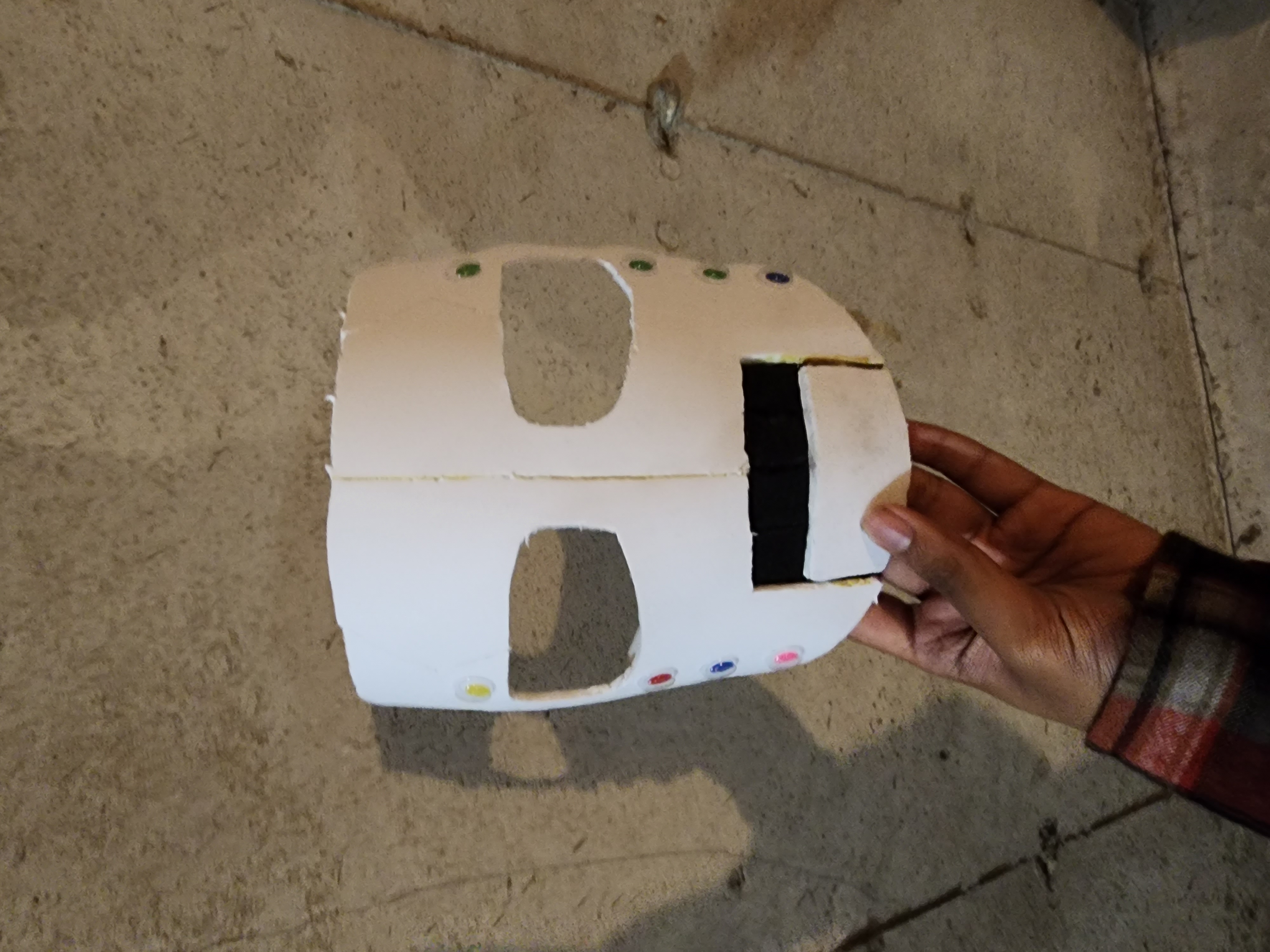 Unpainted mask against wall